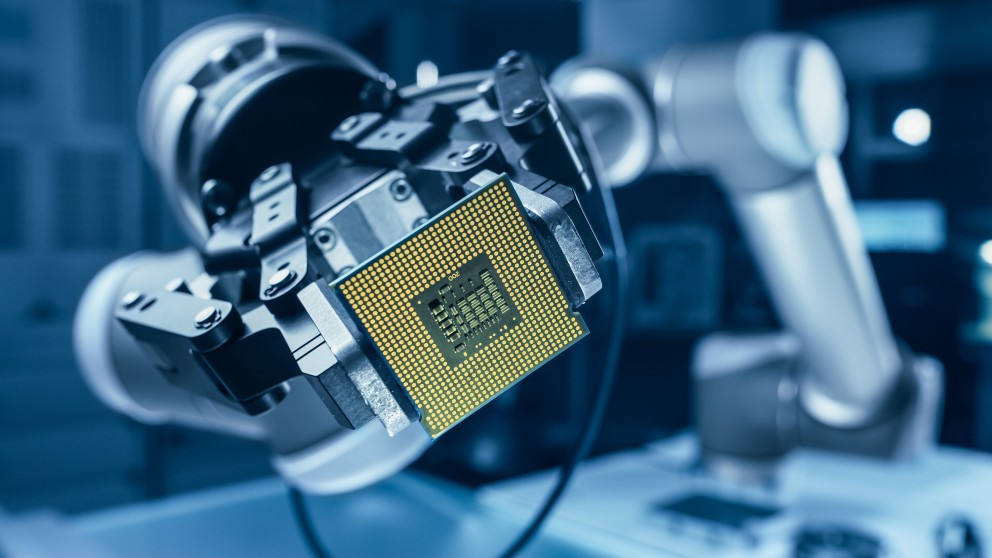 robot arm holding microchip